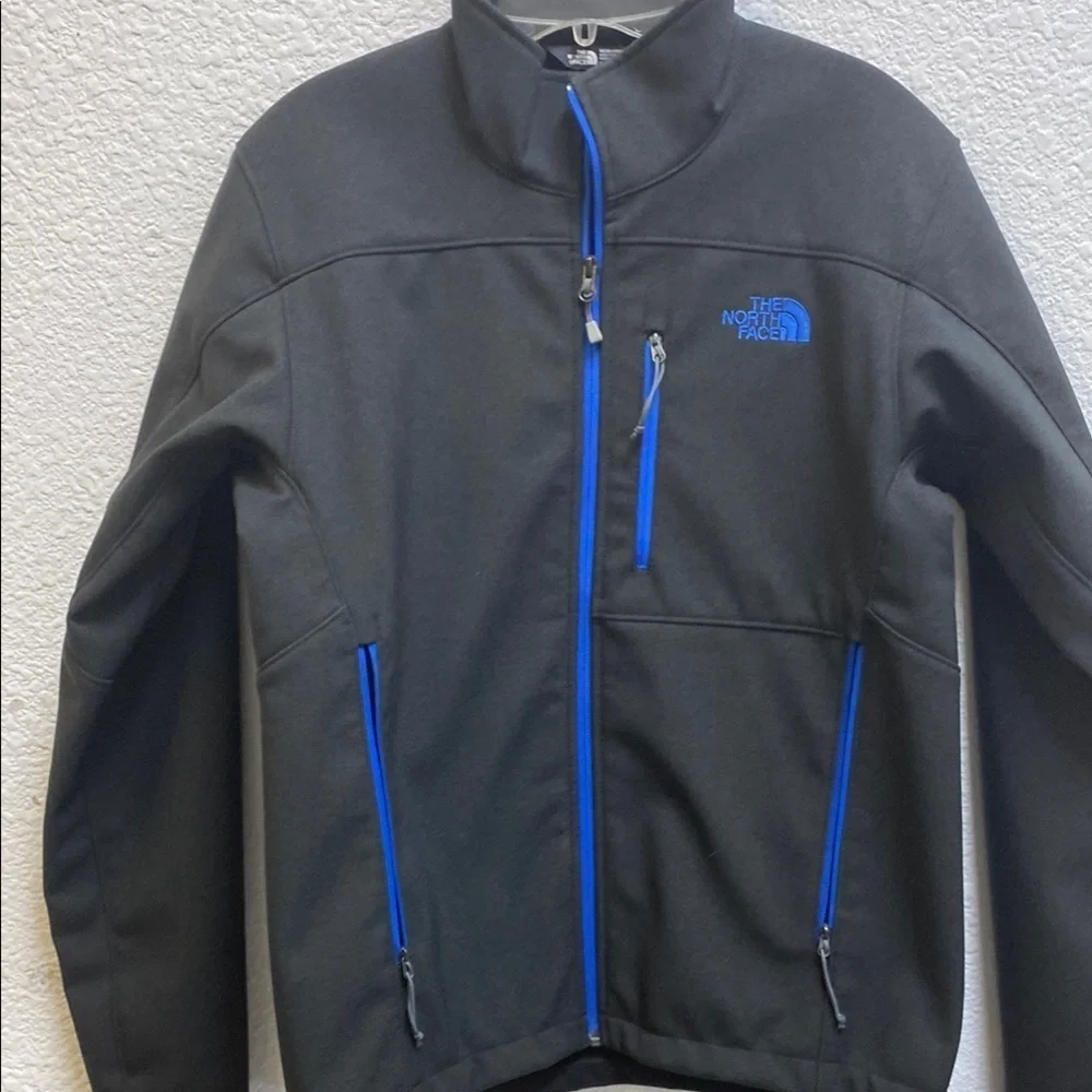 The North Face Men's Black Jacket with Blue Accents